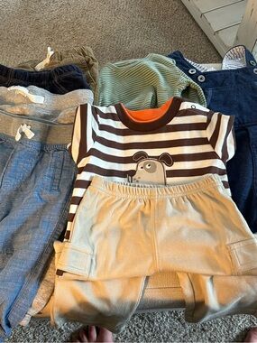 12 m bundle. Carters and Cat & Jack. All in good condition.
